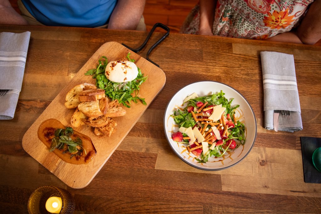 photo of a spread of food from FM Eatery in York County, one of the counties in the Olde English District