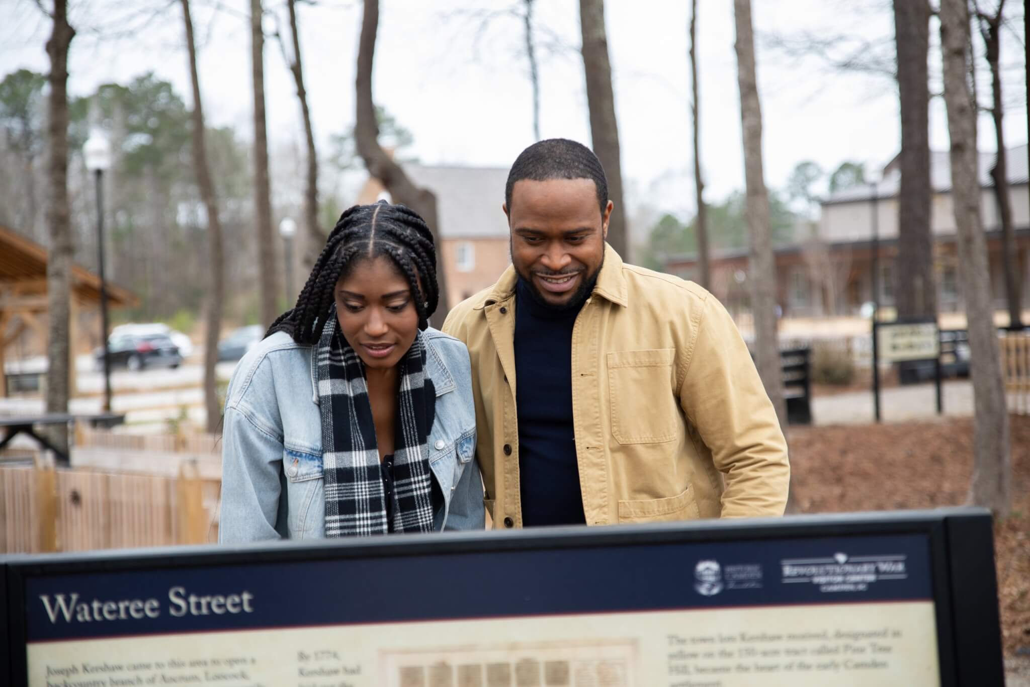 photo of couple reading sign at Historic Camden campus