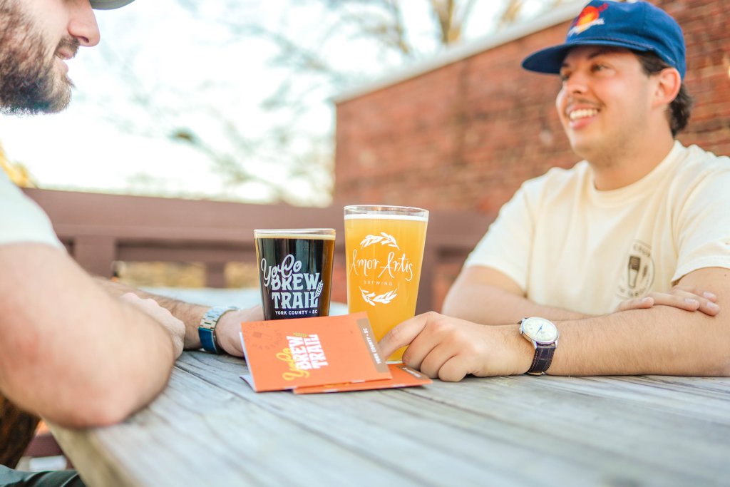 Photo of two friends drinking beer in York County